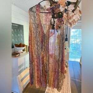 Zadie B’s Snake print vest with matching flower size Large